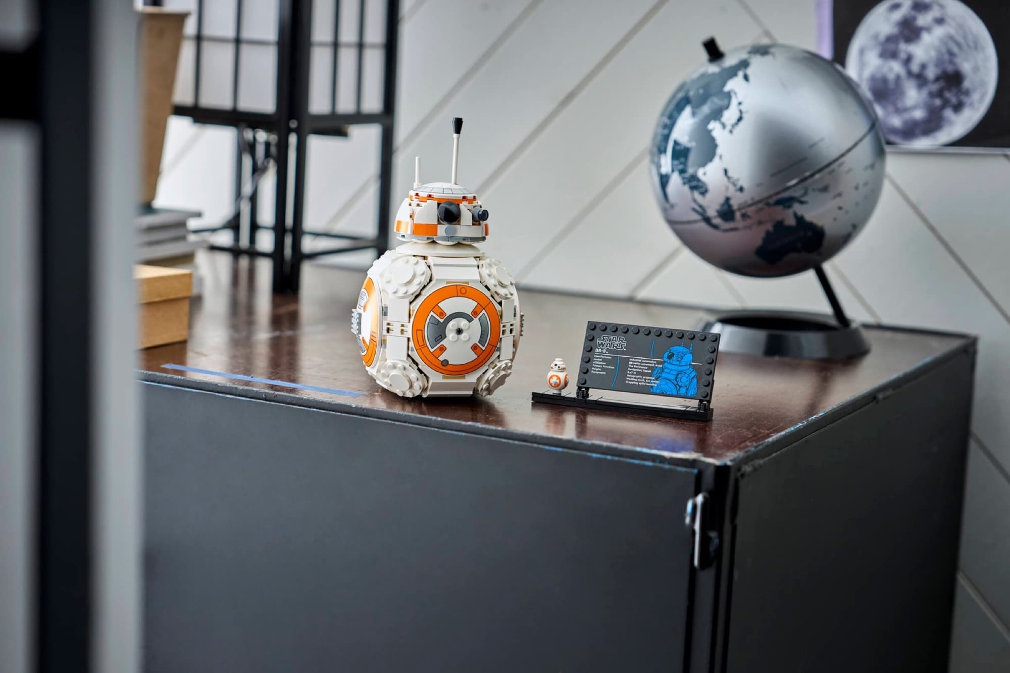 The droid BB-8 being built and played with