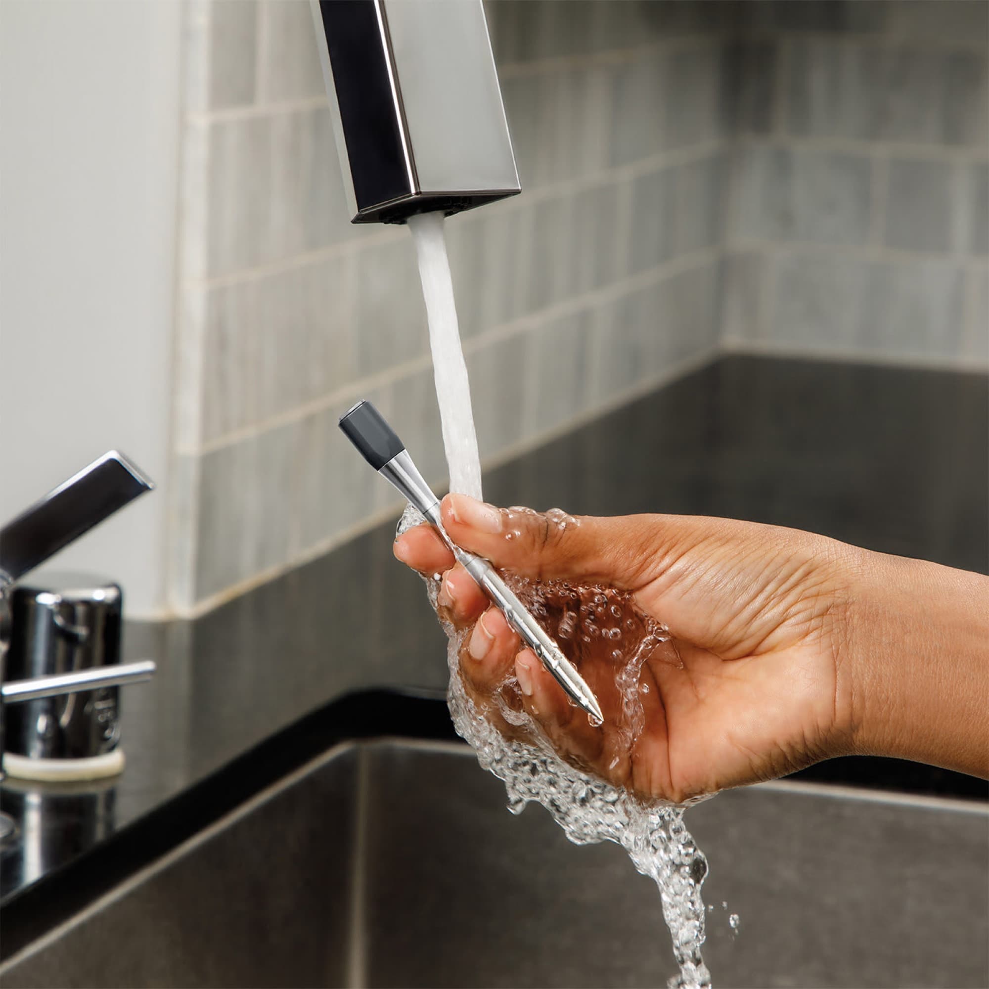 The probe rinsed under the tap