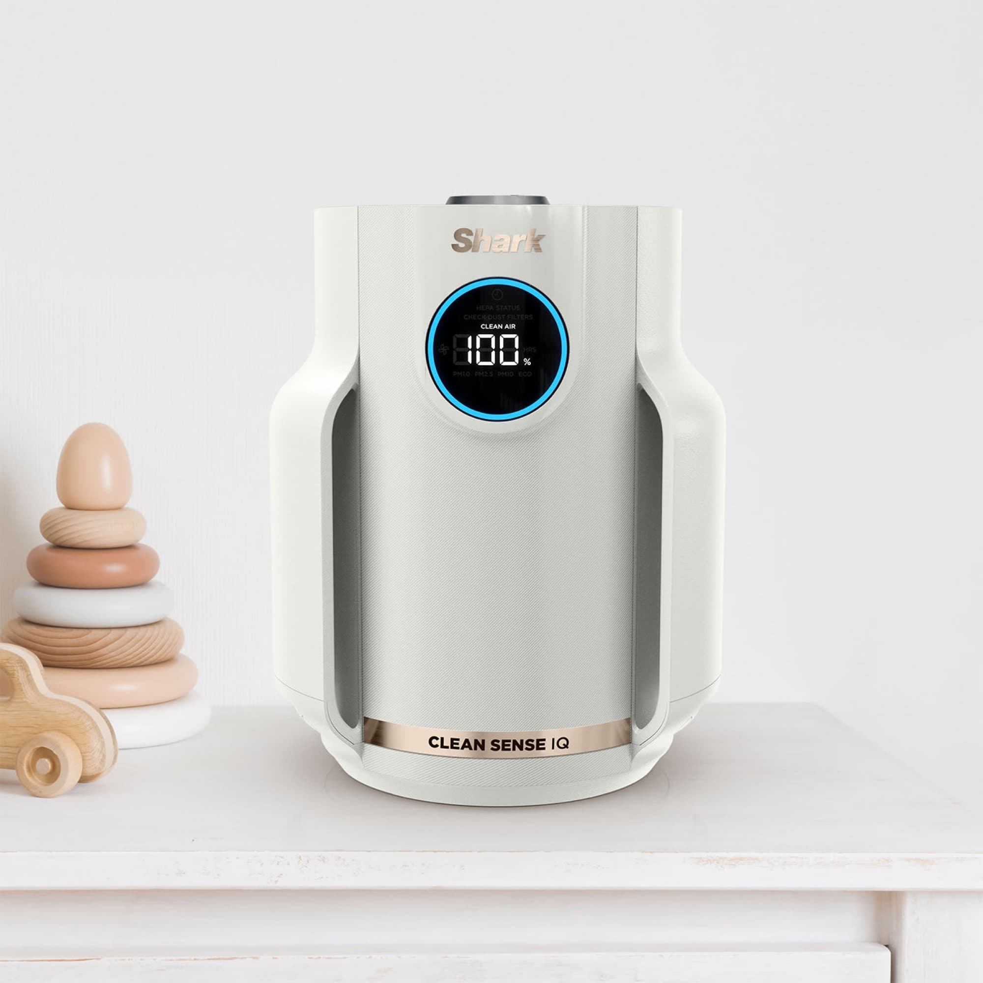 The compact air purifier on a shelf