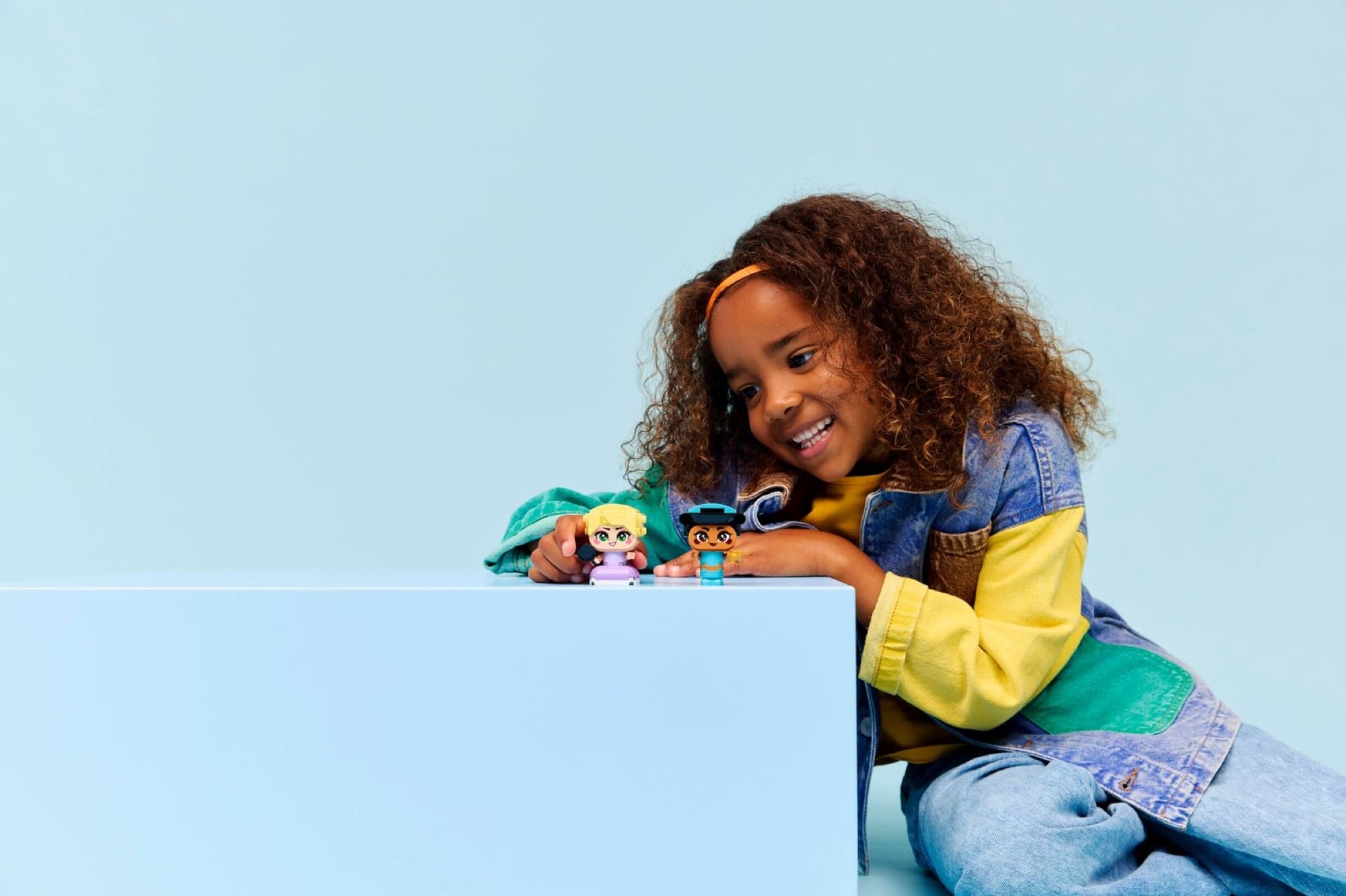 Mini Jasmine and Rapunzel being built and played with