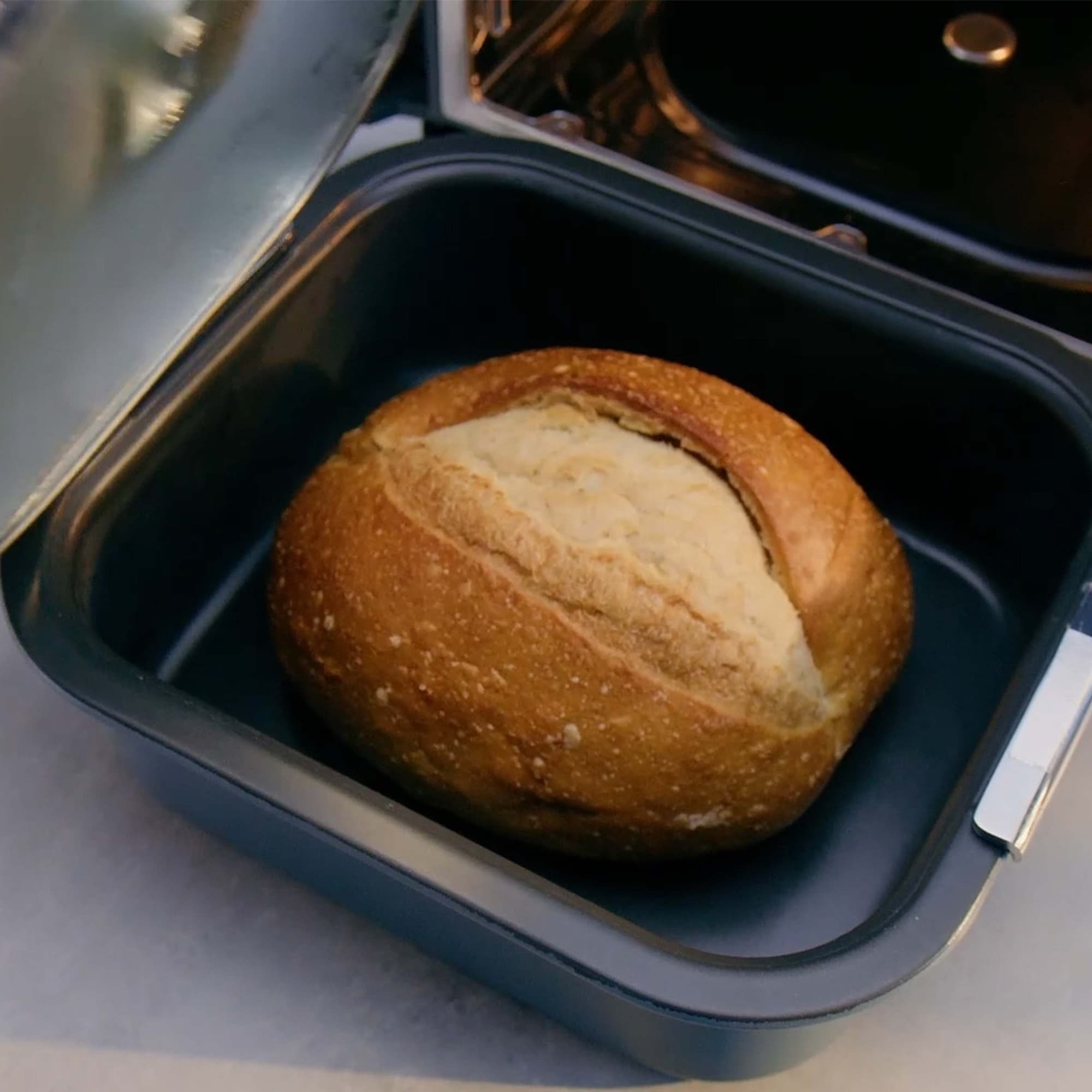Freshly baked bread in the casserole