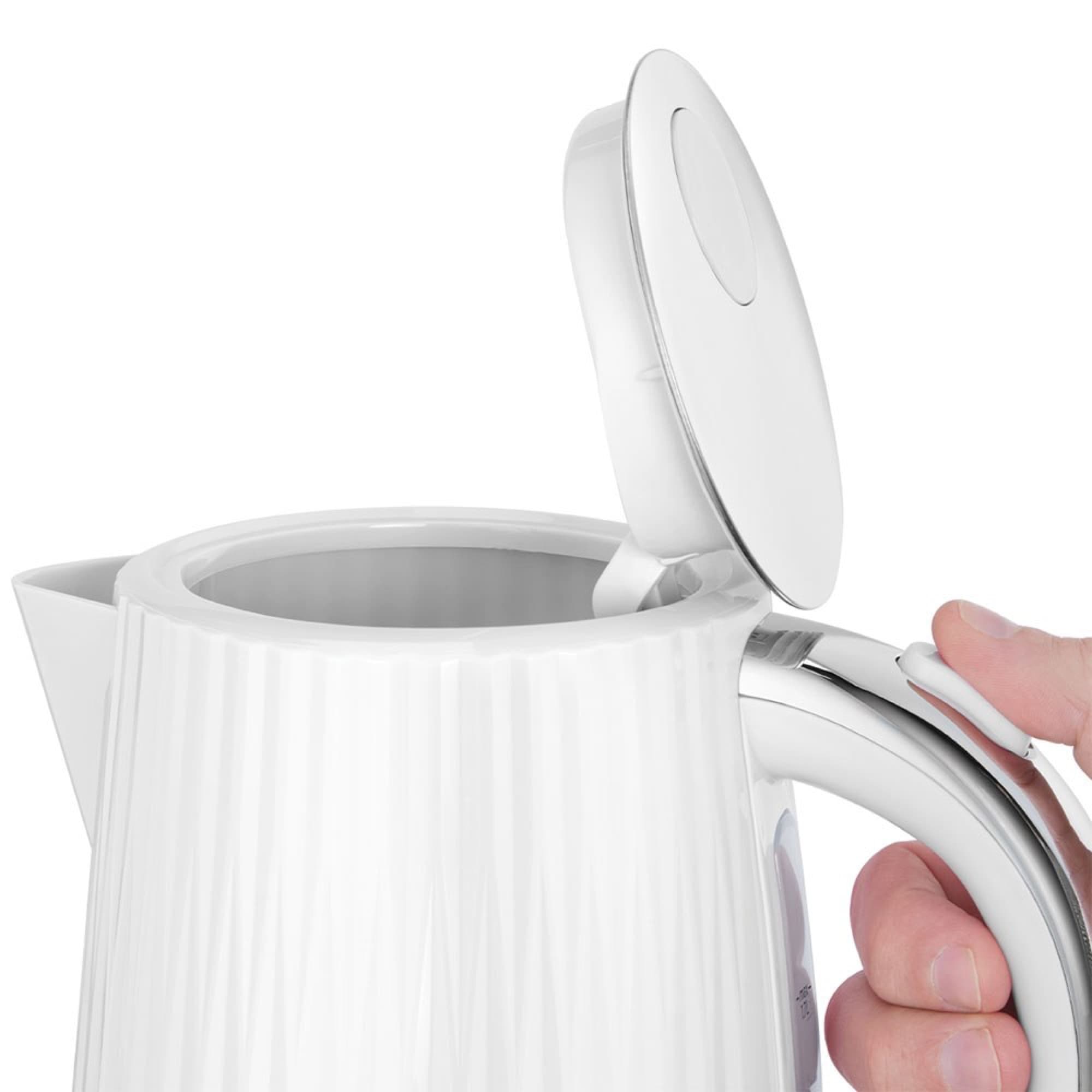 The lid opens with a button