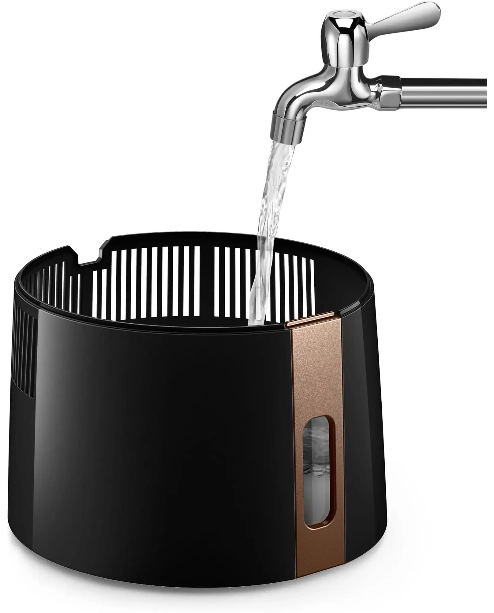 The water container being filled under the tap