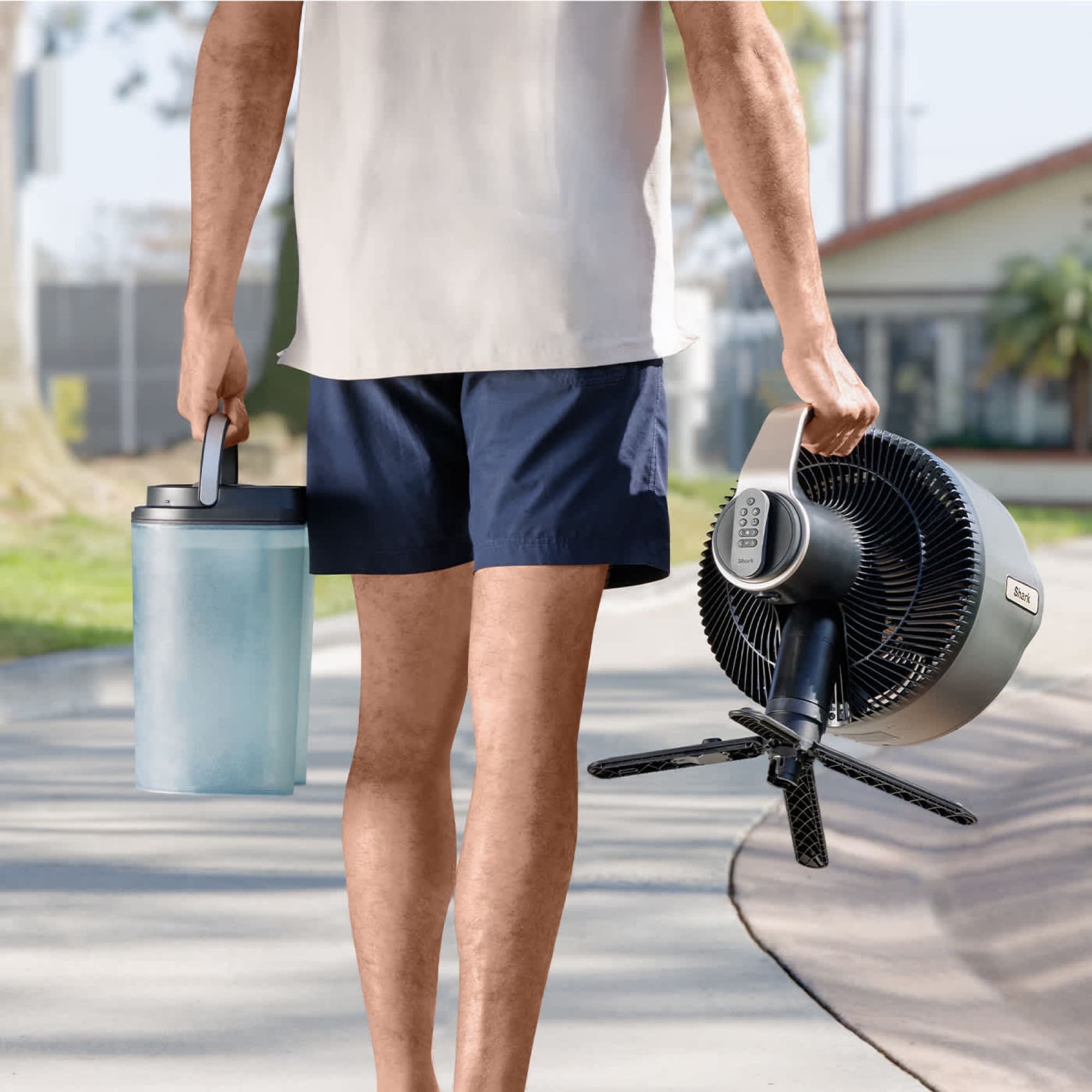 Carrying the fan and tank outside