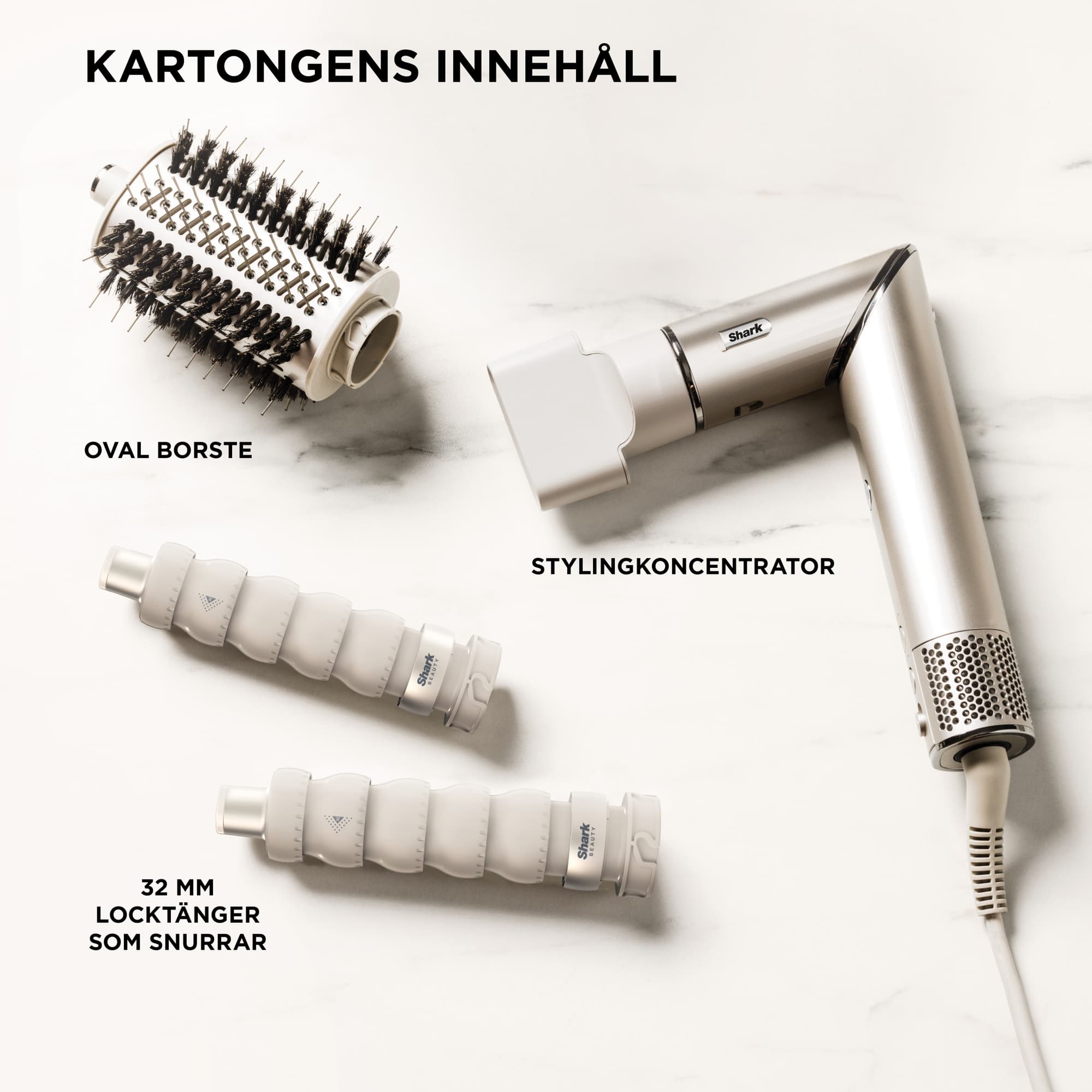 In the box: oval brush, concentrator and two curlers