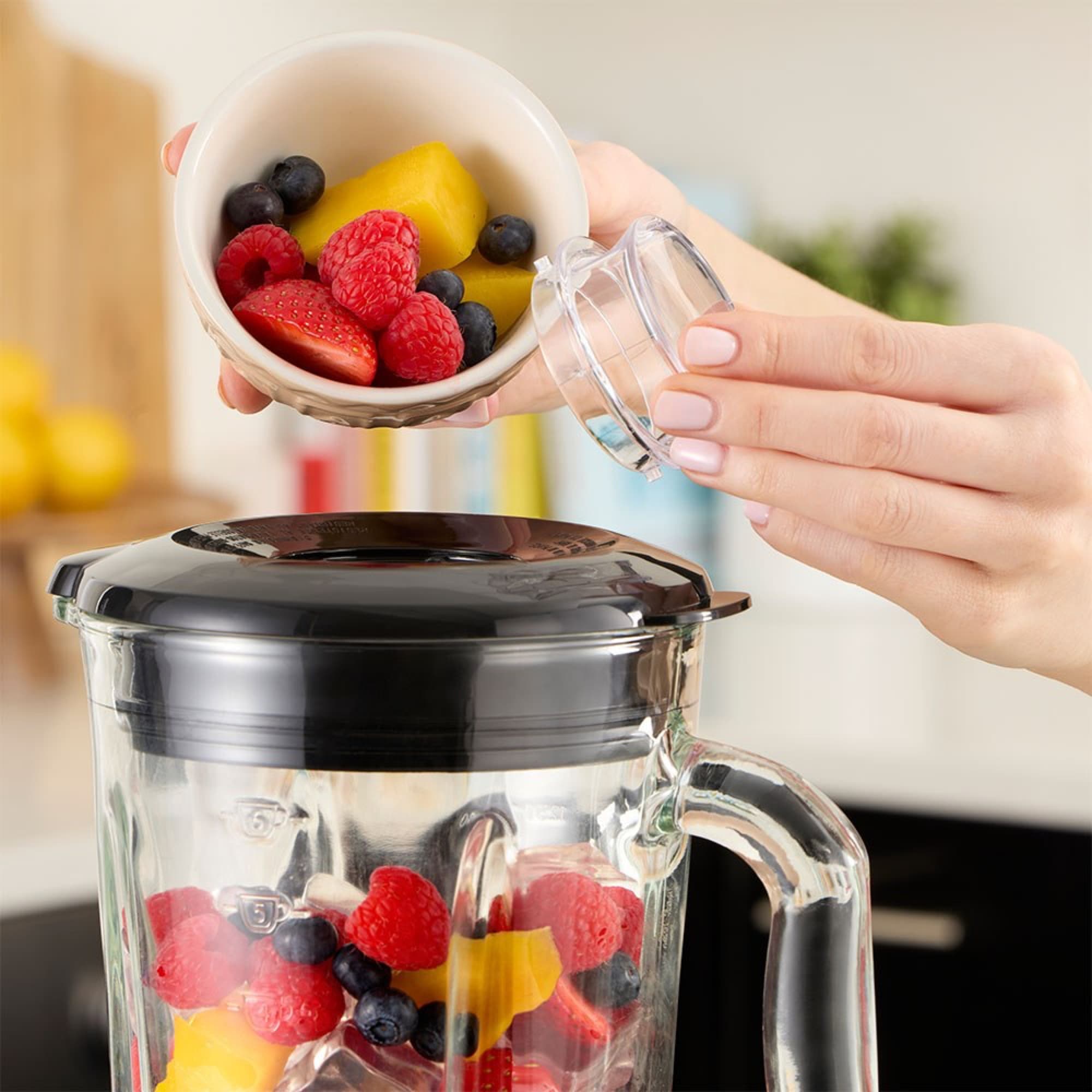 Adding fruit through the lid
