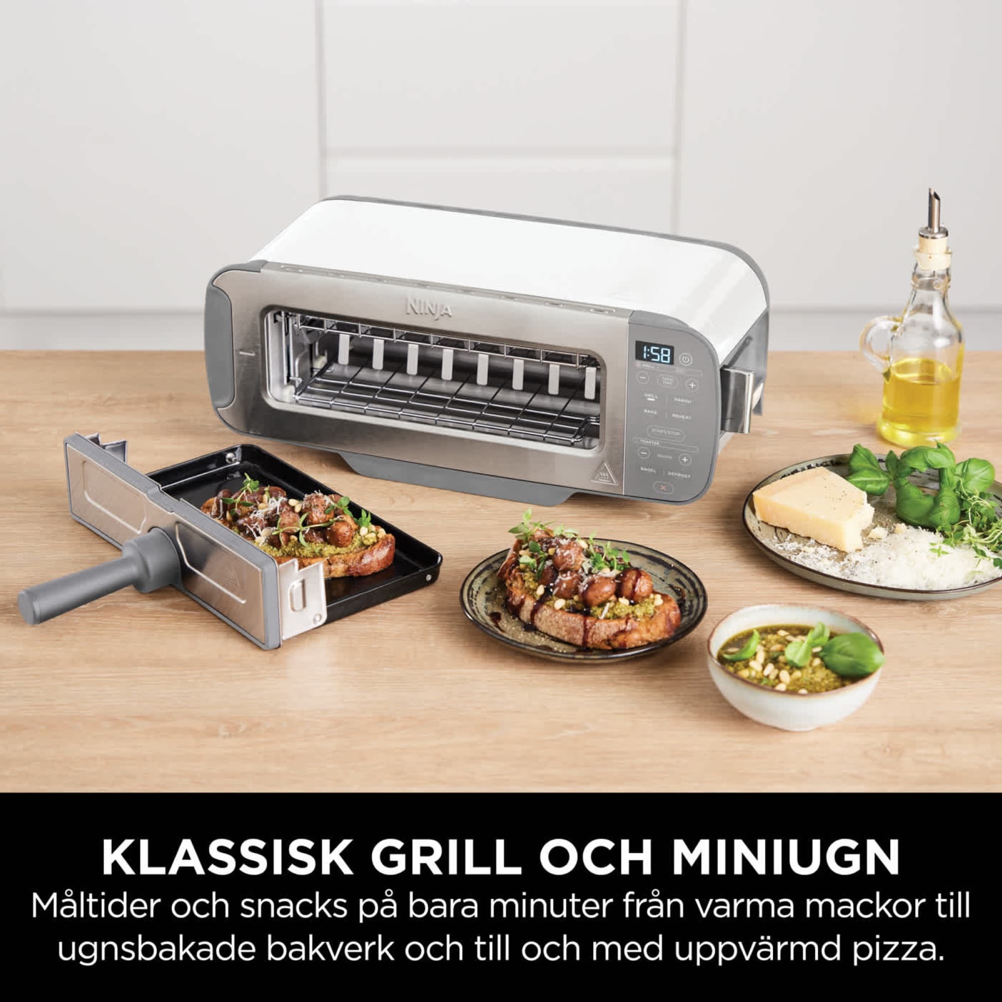 The grill tray with dishes from the grill and mini oven