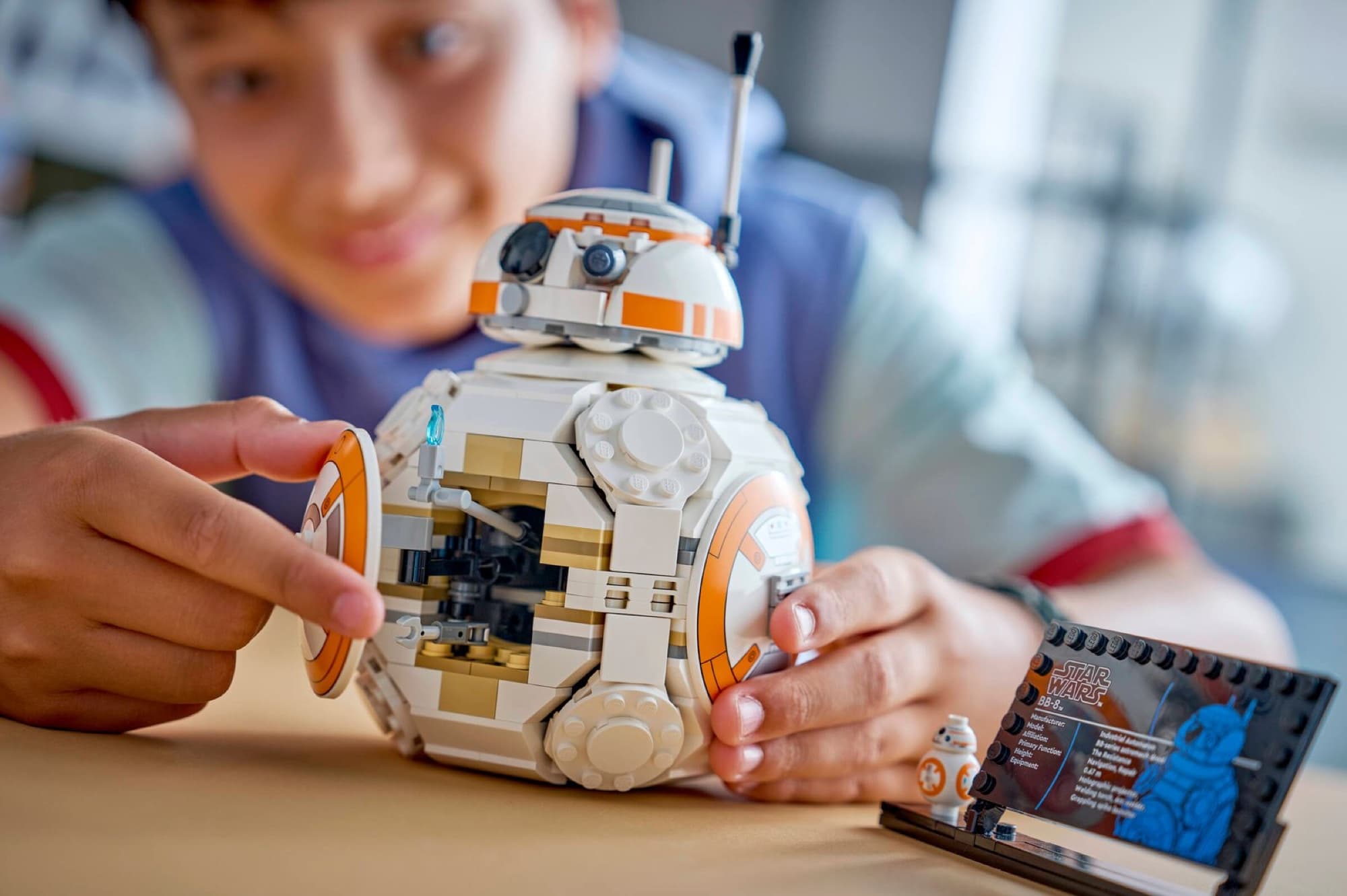The droid BB-8 being built and played with