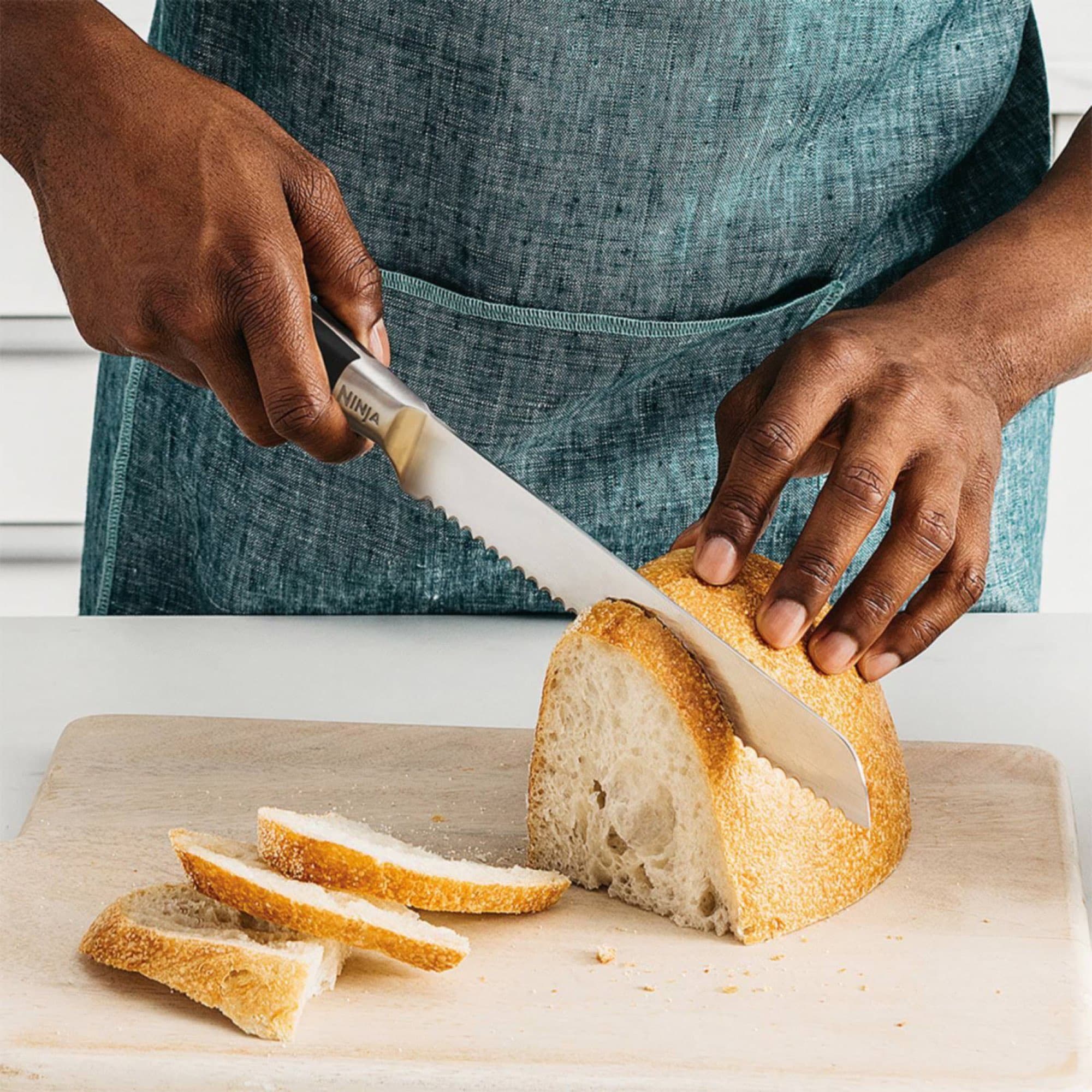 The bread knife slicing sourdough bread