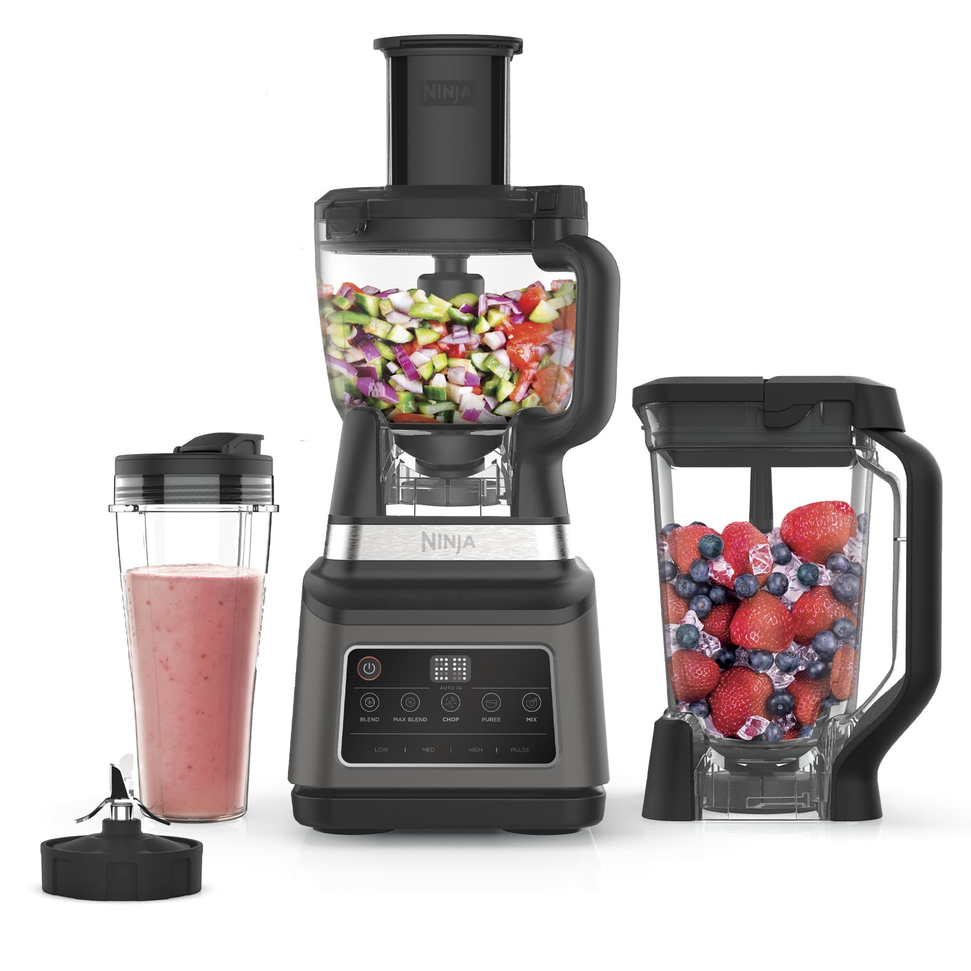 Food processor with chopped vegetables, smoothie and berry jug