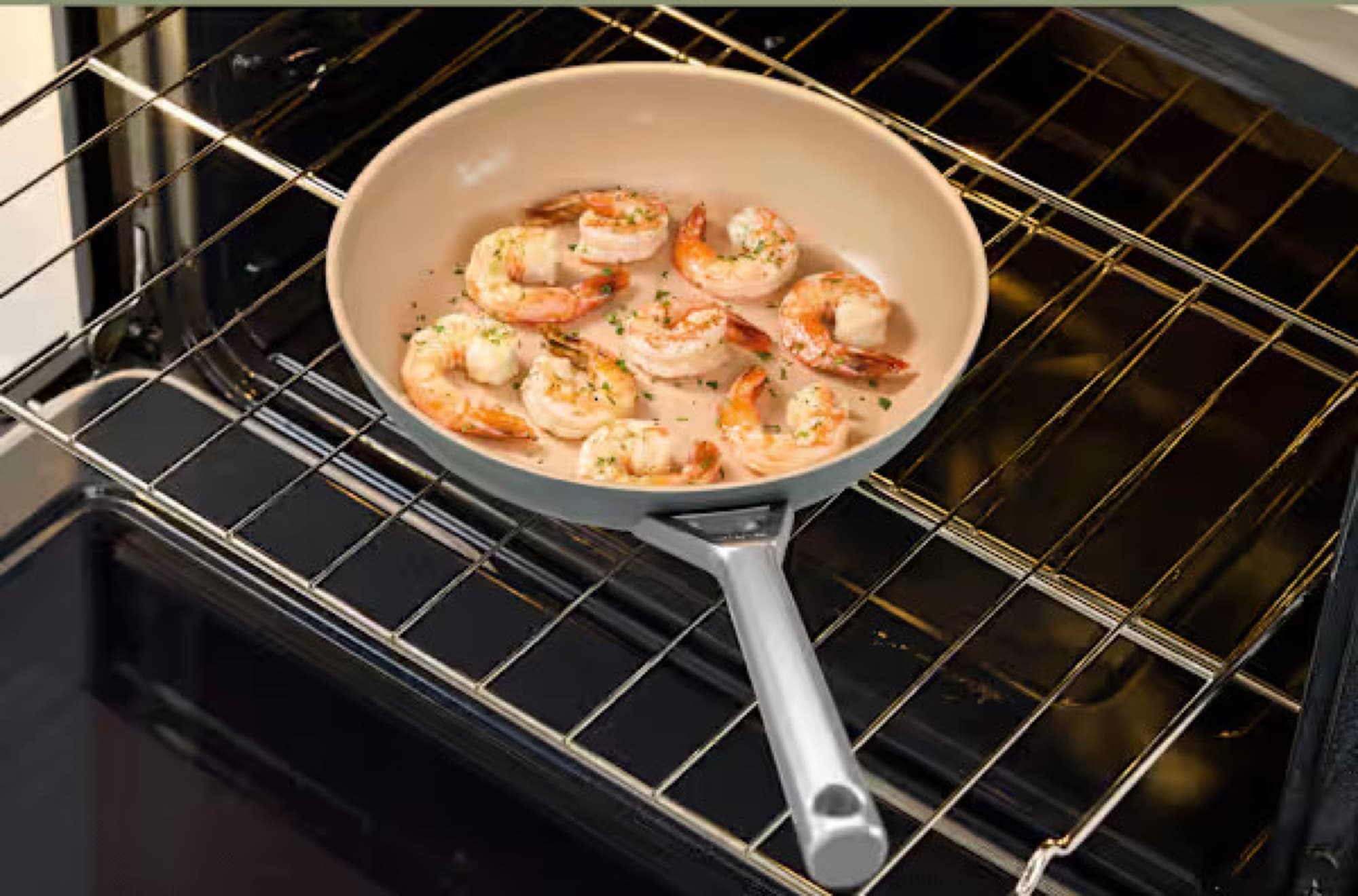 The pan with prawns in the oven