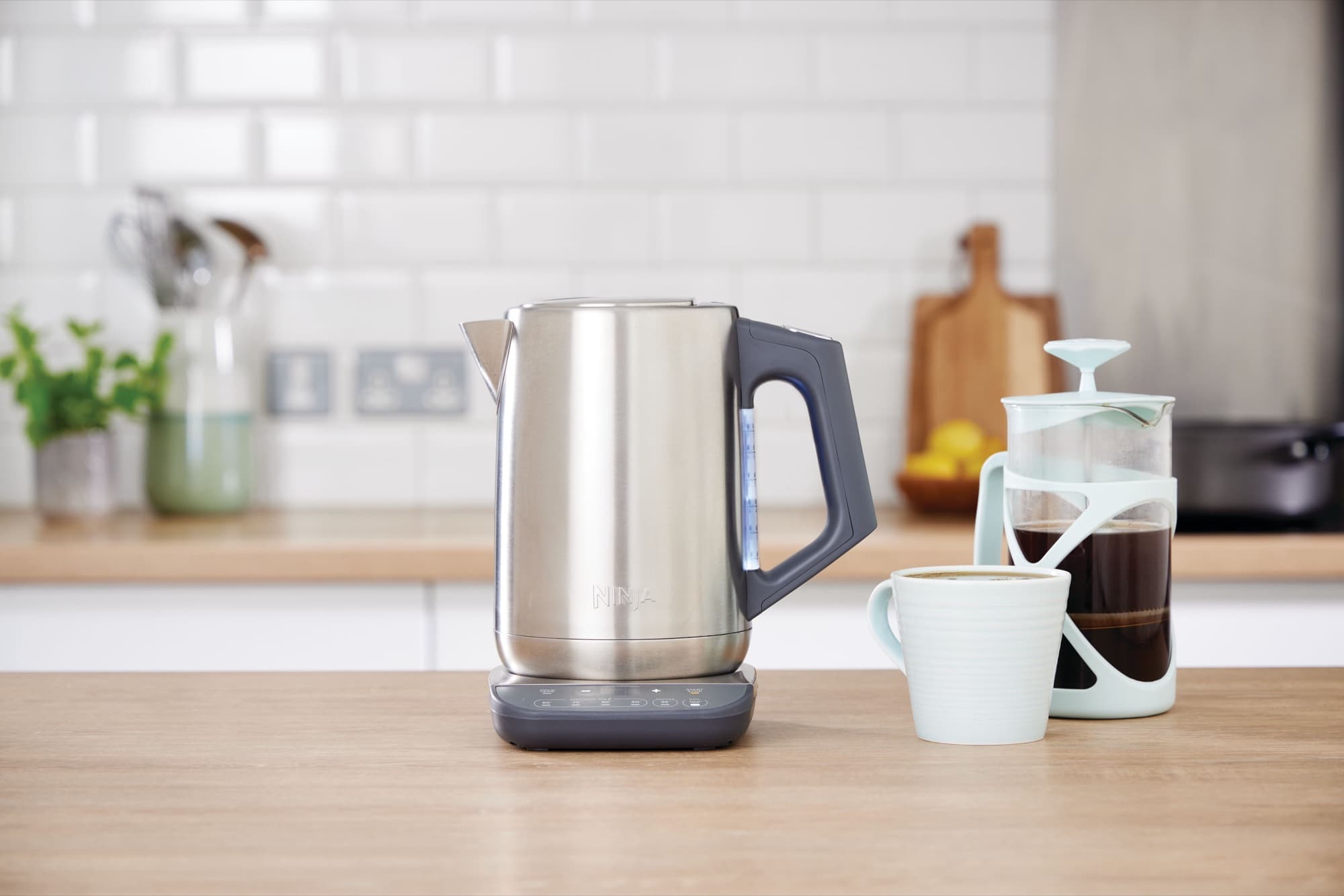 The kettle next to a cafetière of coffee