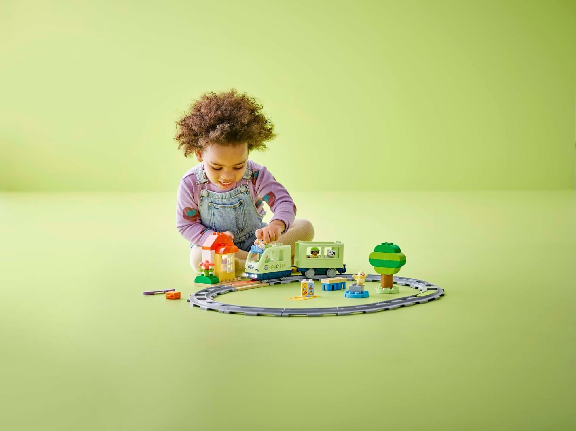 DUPLO interactive adventure train being built and played with