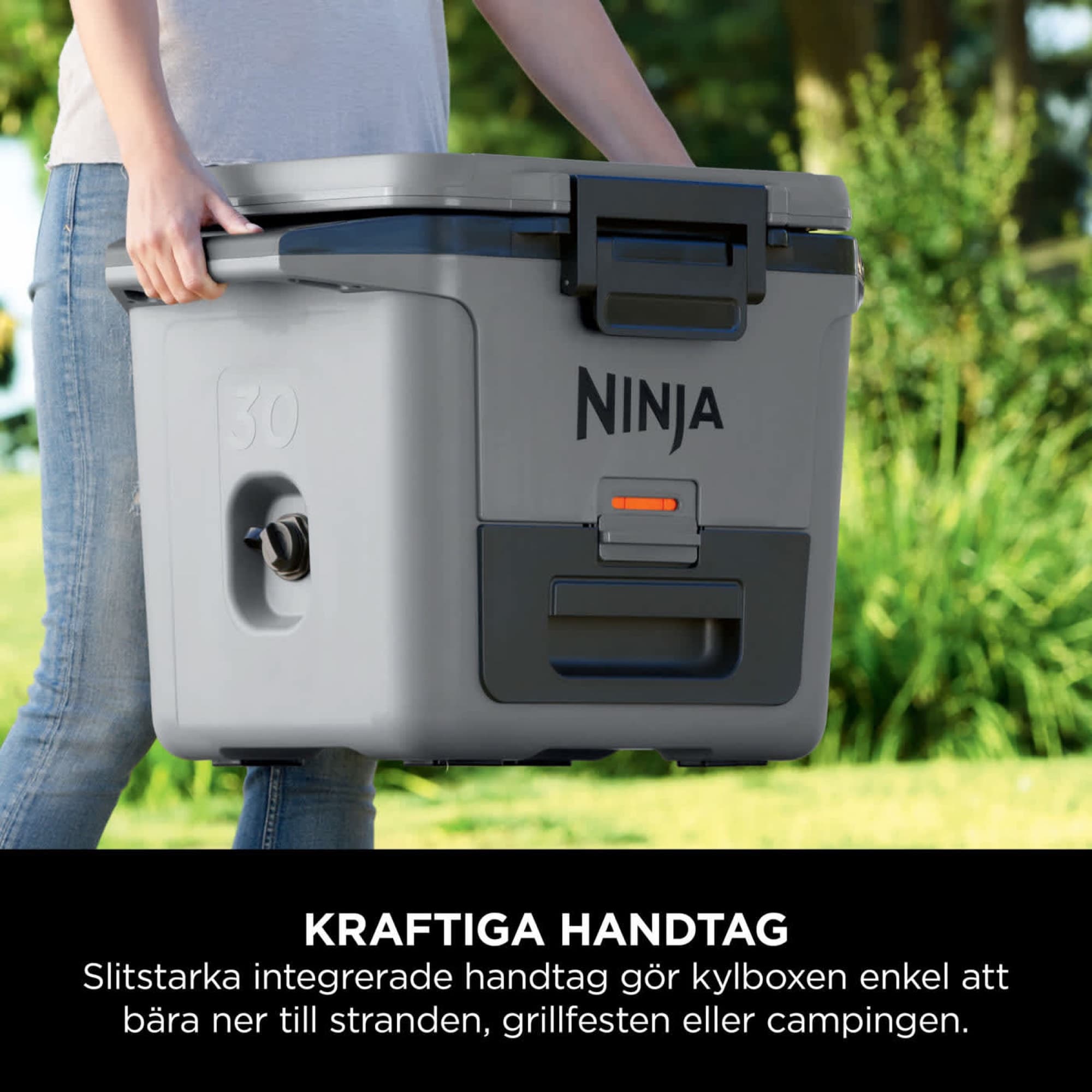 The cooler carried by the moulded handles