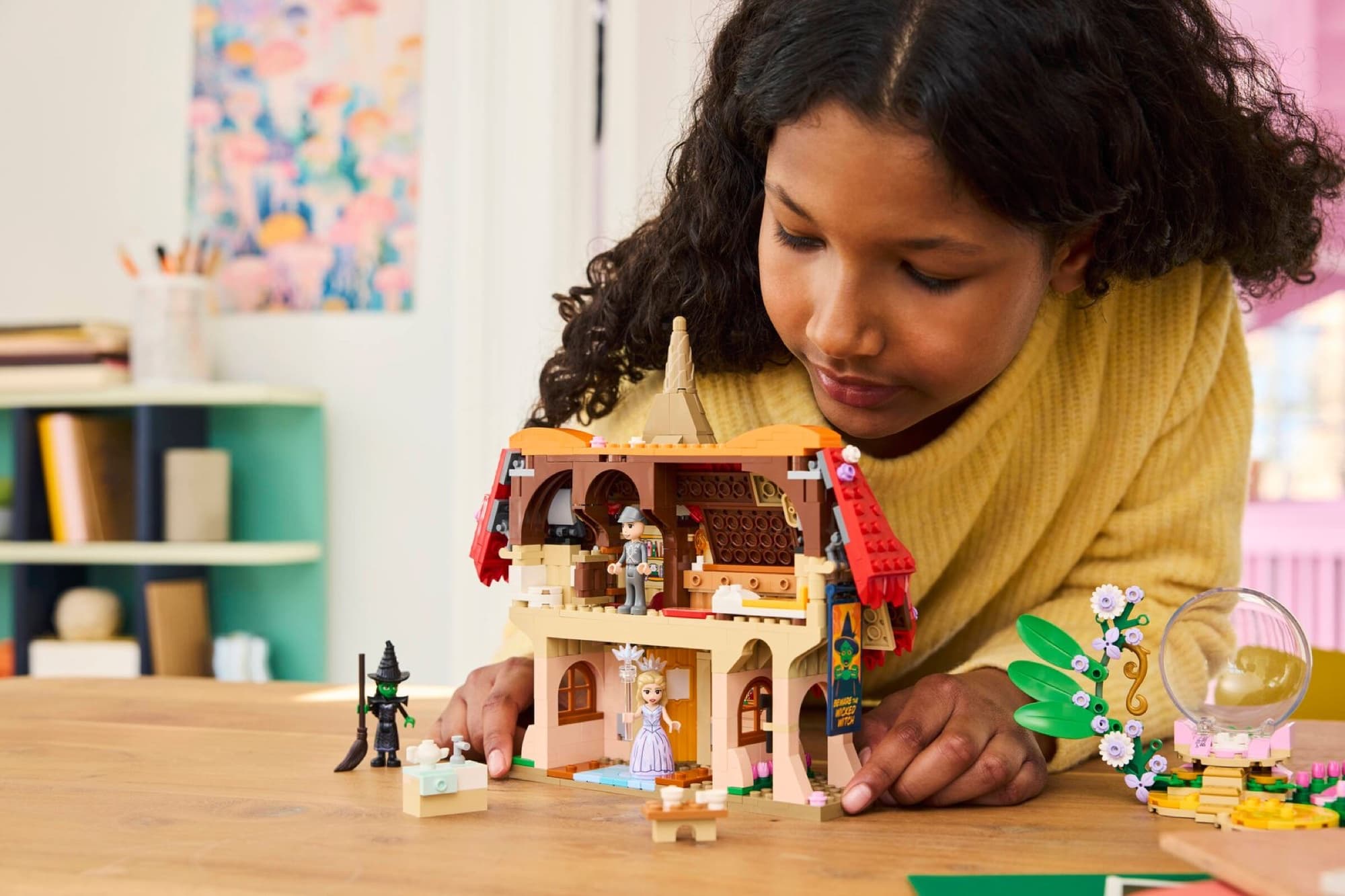 LEGO Munchkinland cottage being built and played with