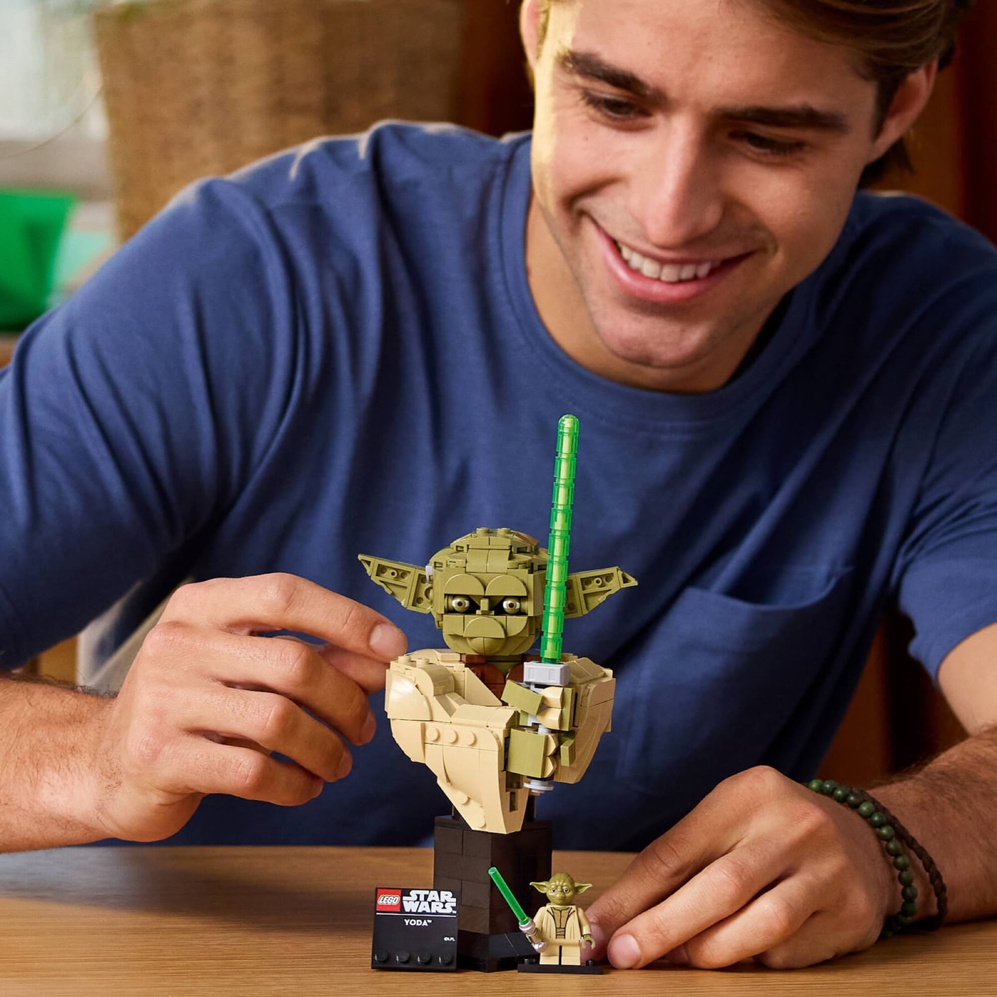 The Yoda bust being built and played with