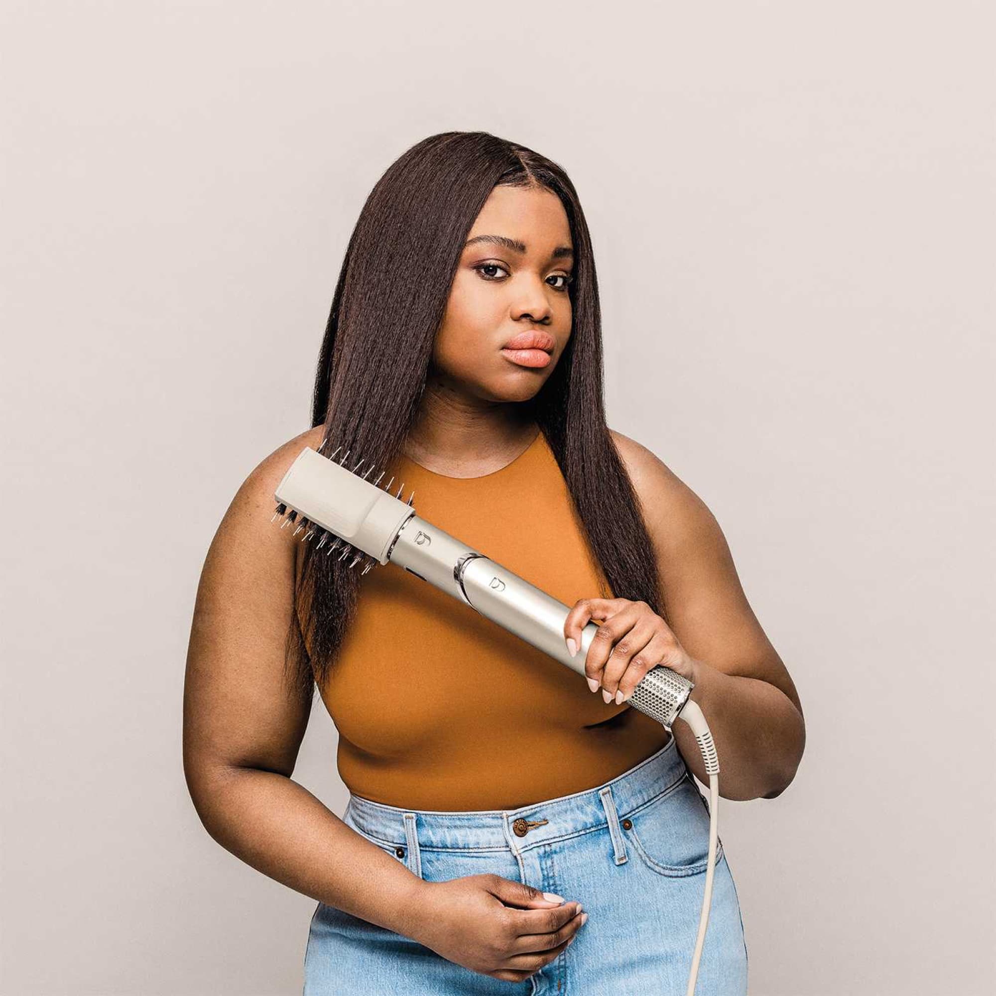 Blow-drying with FlexStyle and the paddle brush