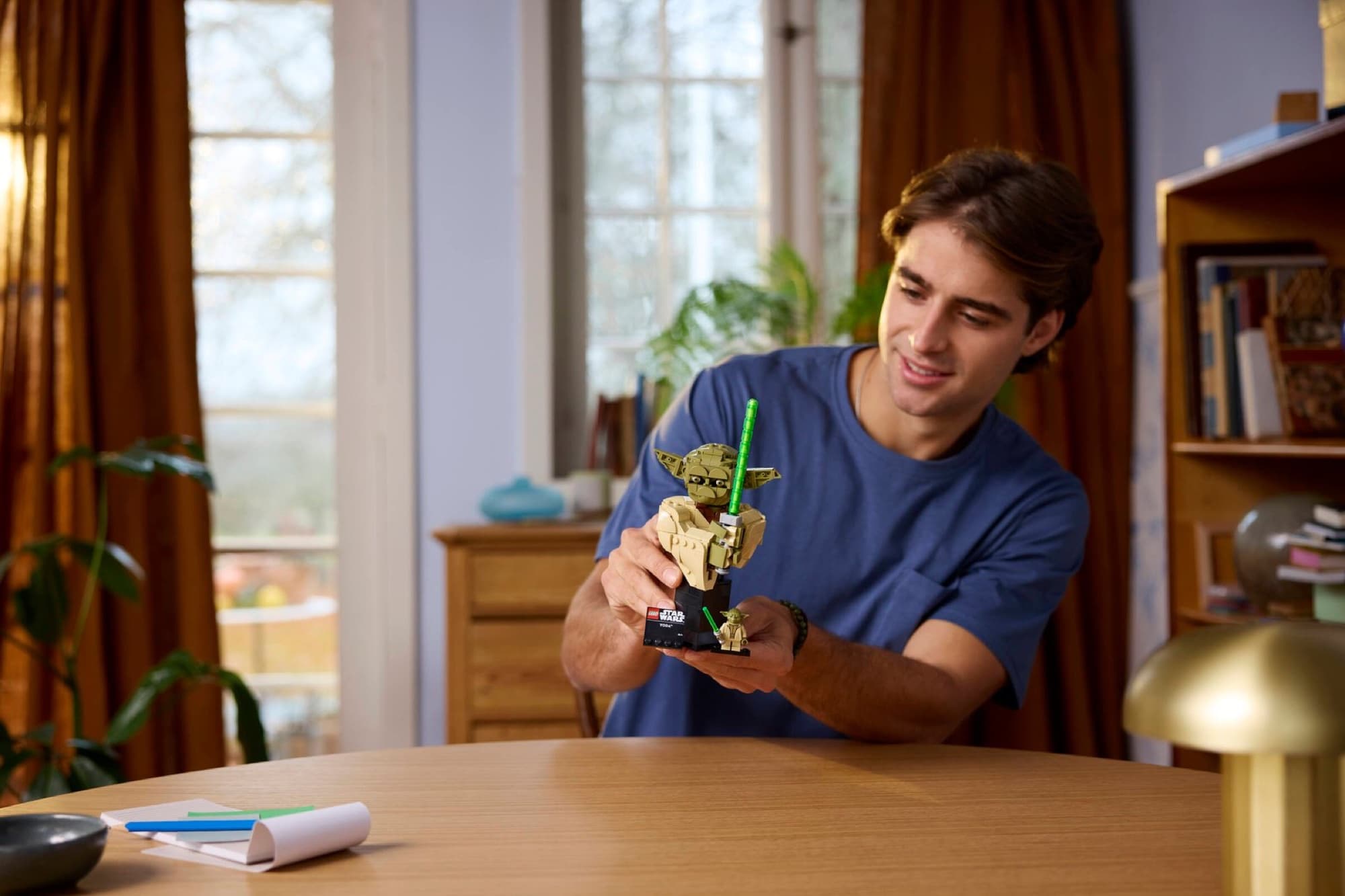 The Yoda bust being built and played with