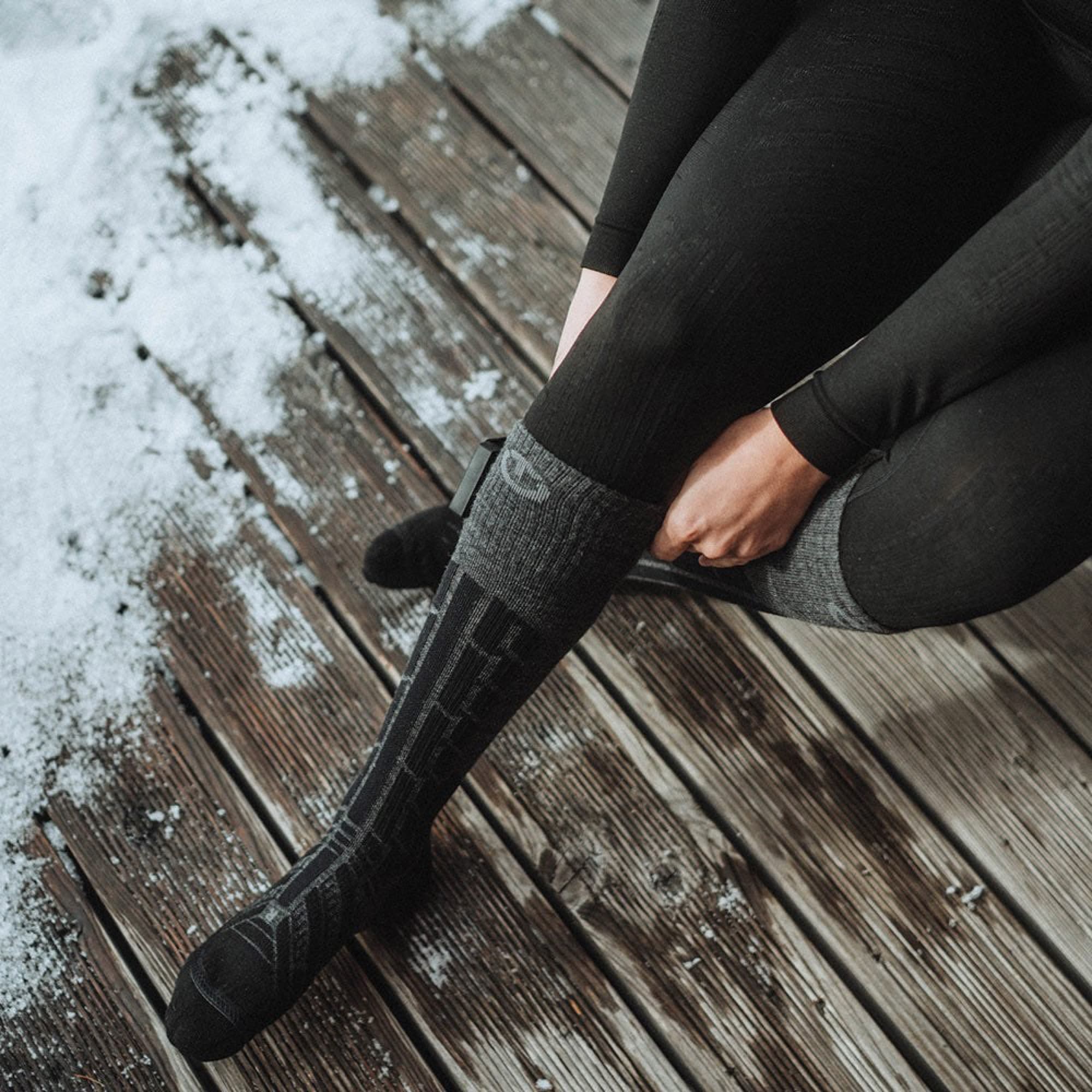 Putting on the sock before skiing