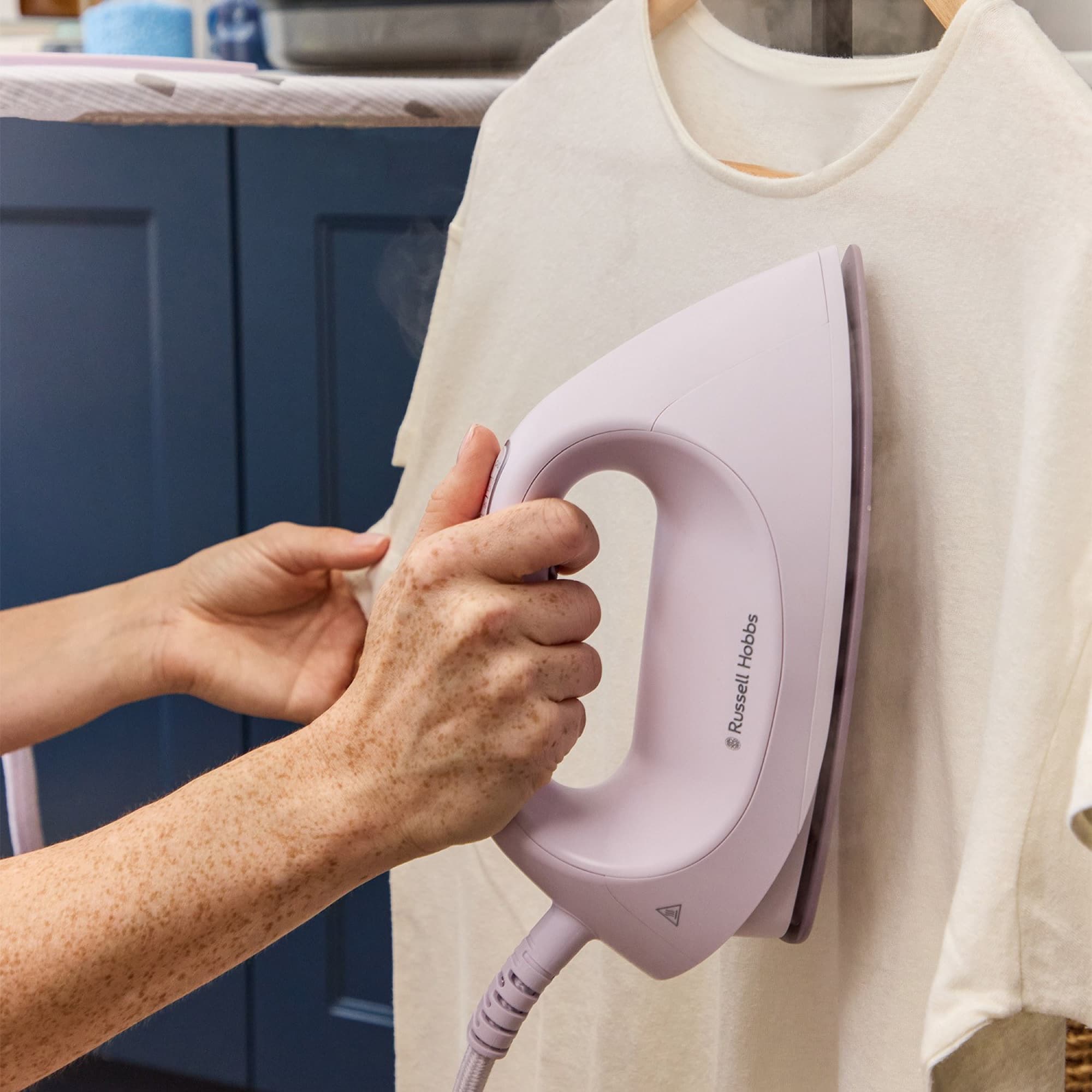 The iron steaming a garment