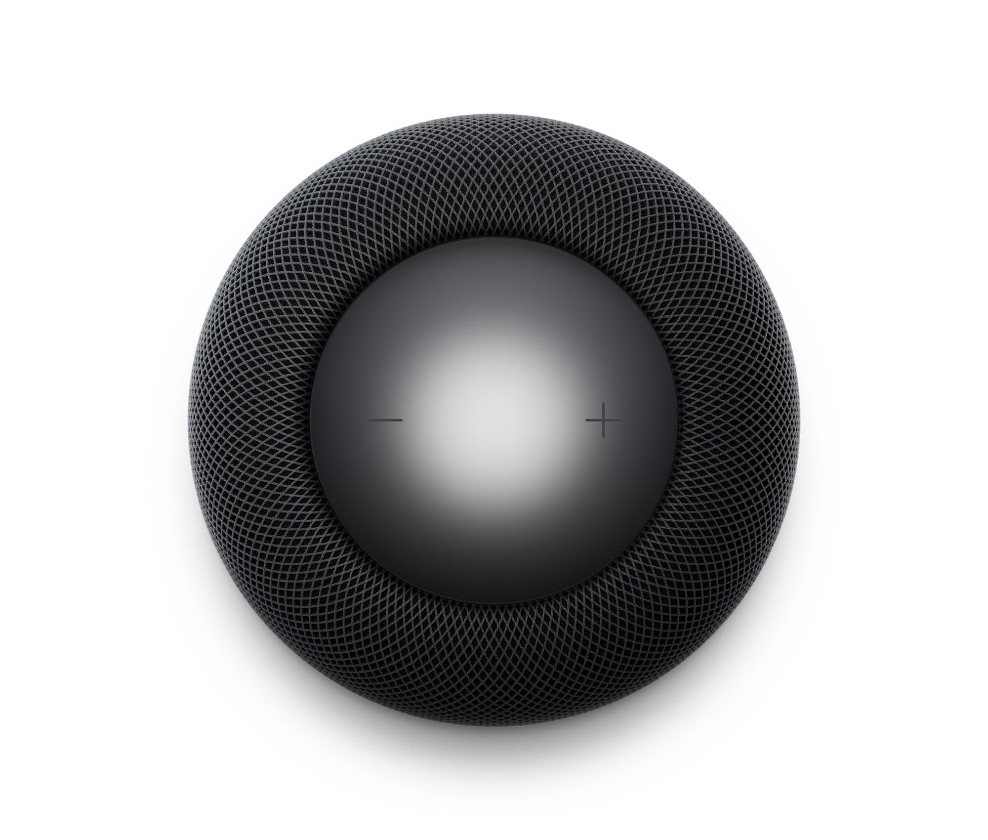 The touch surface on top of a midnight HomePod