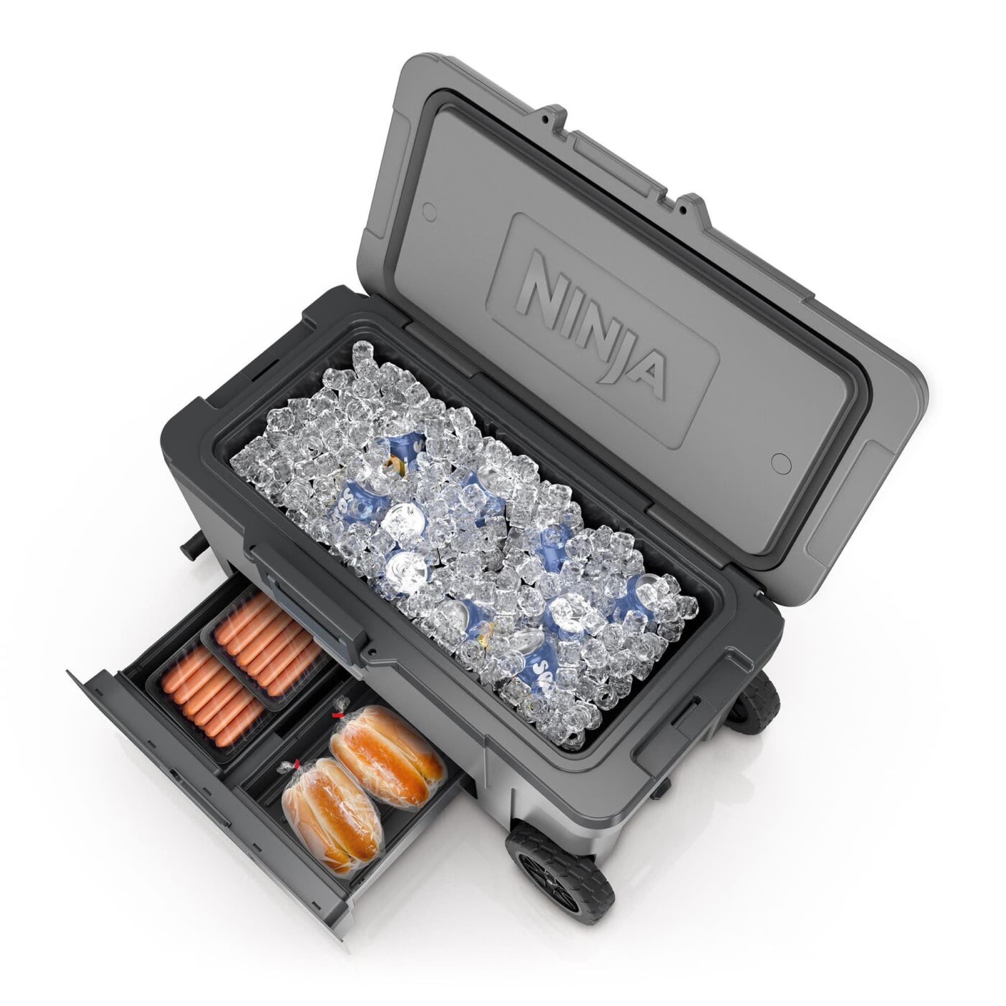 The cooler open with ice and food in the drawer