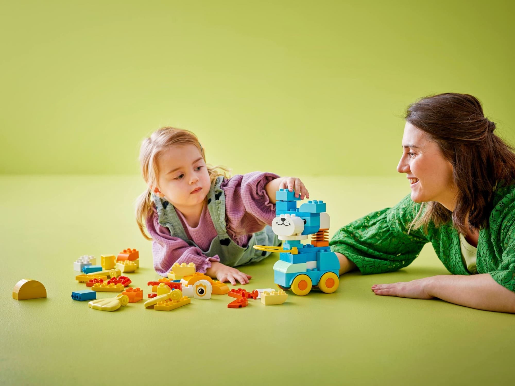 DUPLO animals on wheels being built and played with
