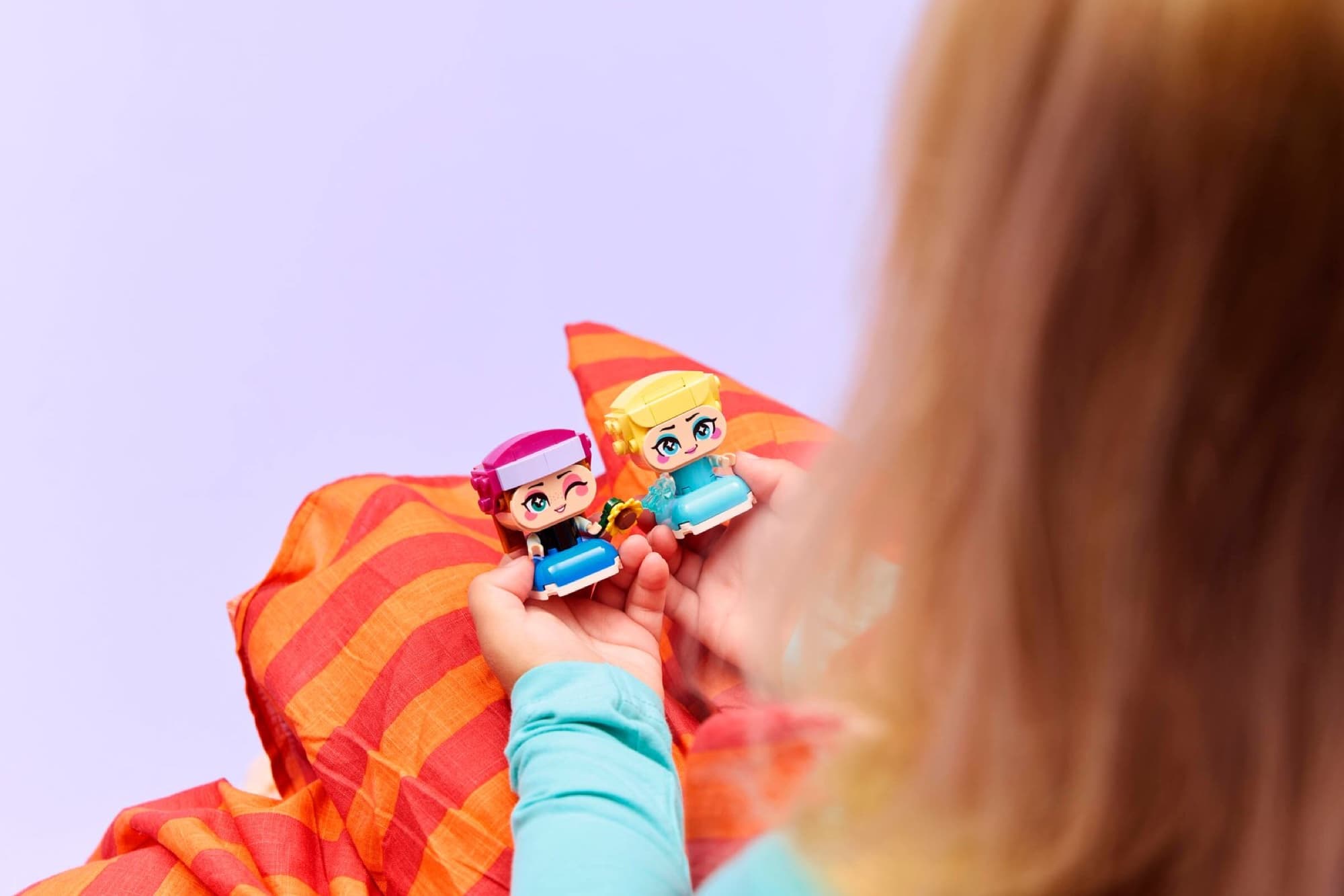 Mini Anna and Elsa being built and played with