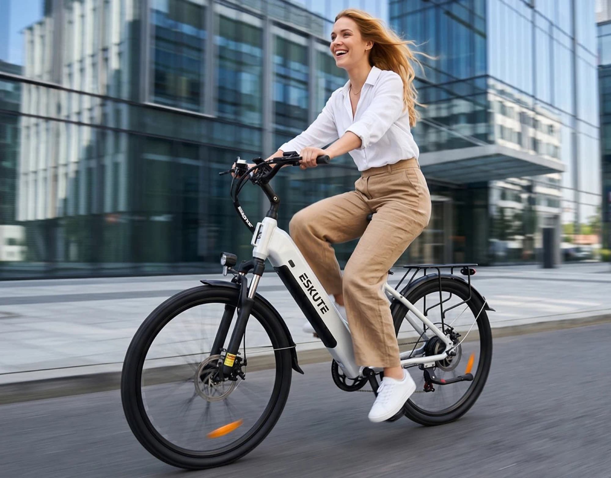 Woman riding the Eskute C202 in the city