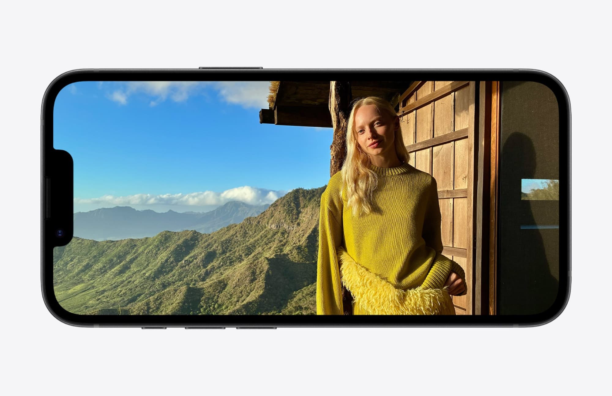 6.1-inch display showing a photo in landscape