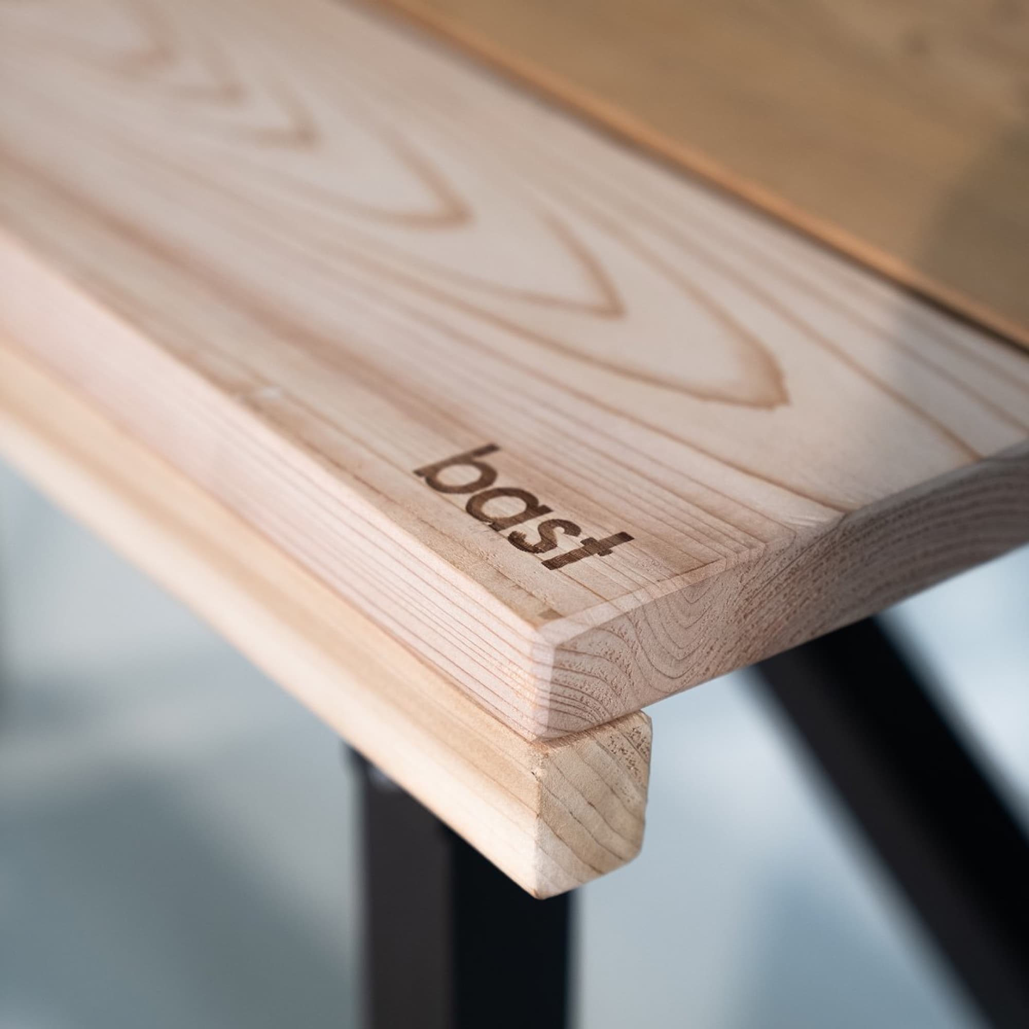 Cedar with the Bast logo