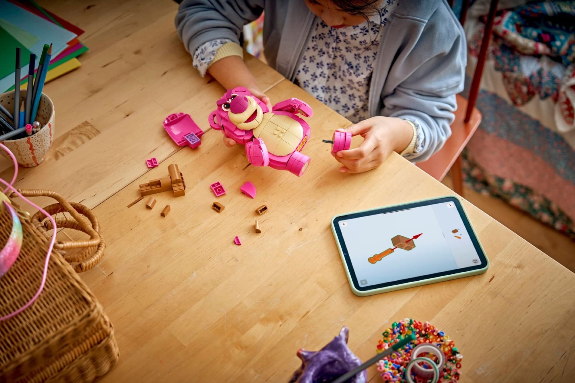 Lotso from Toy Story being built and played with