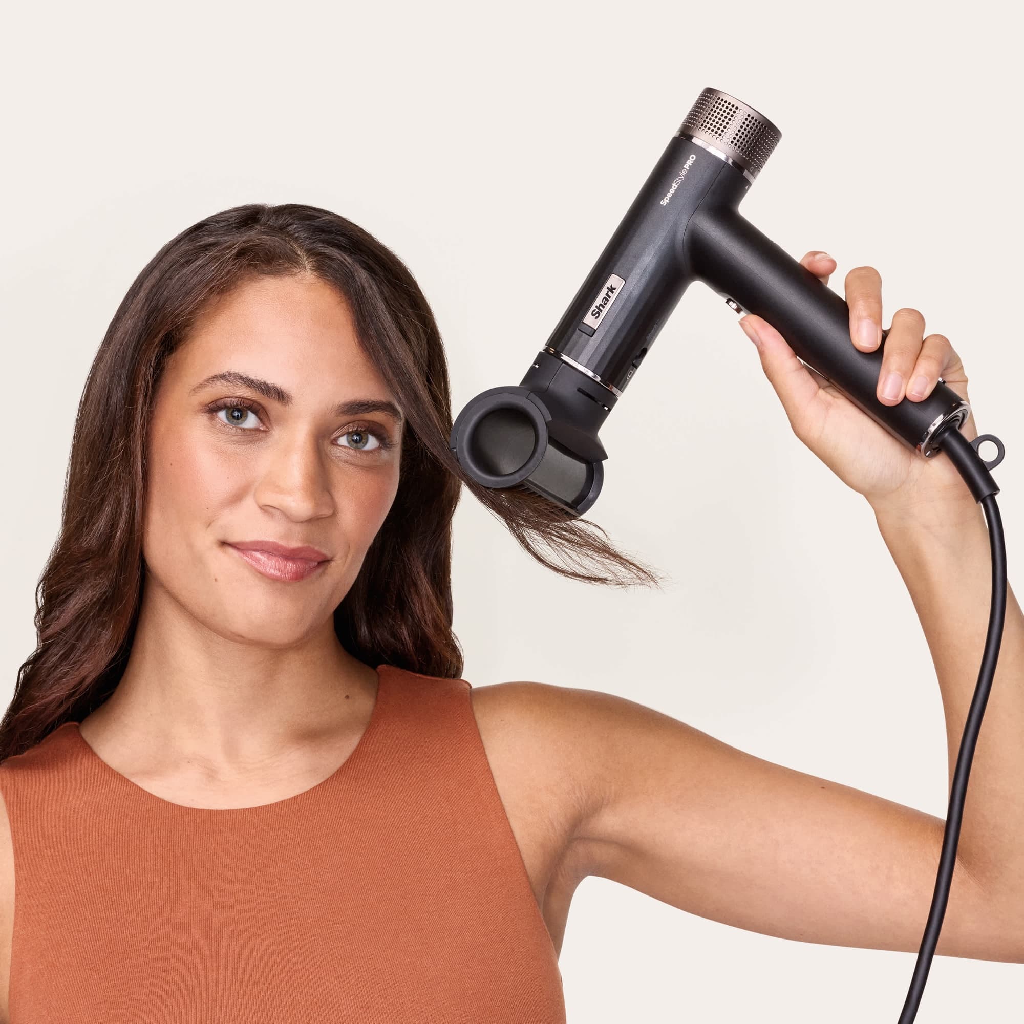 FrizzFighter smoothing the hair