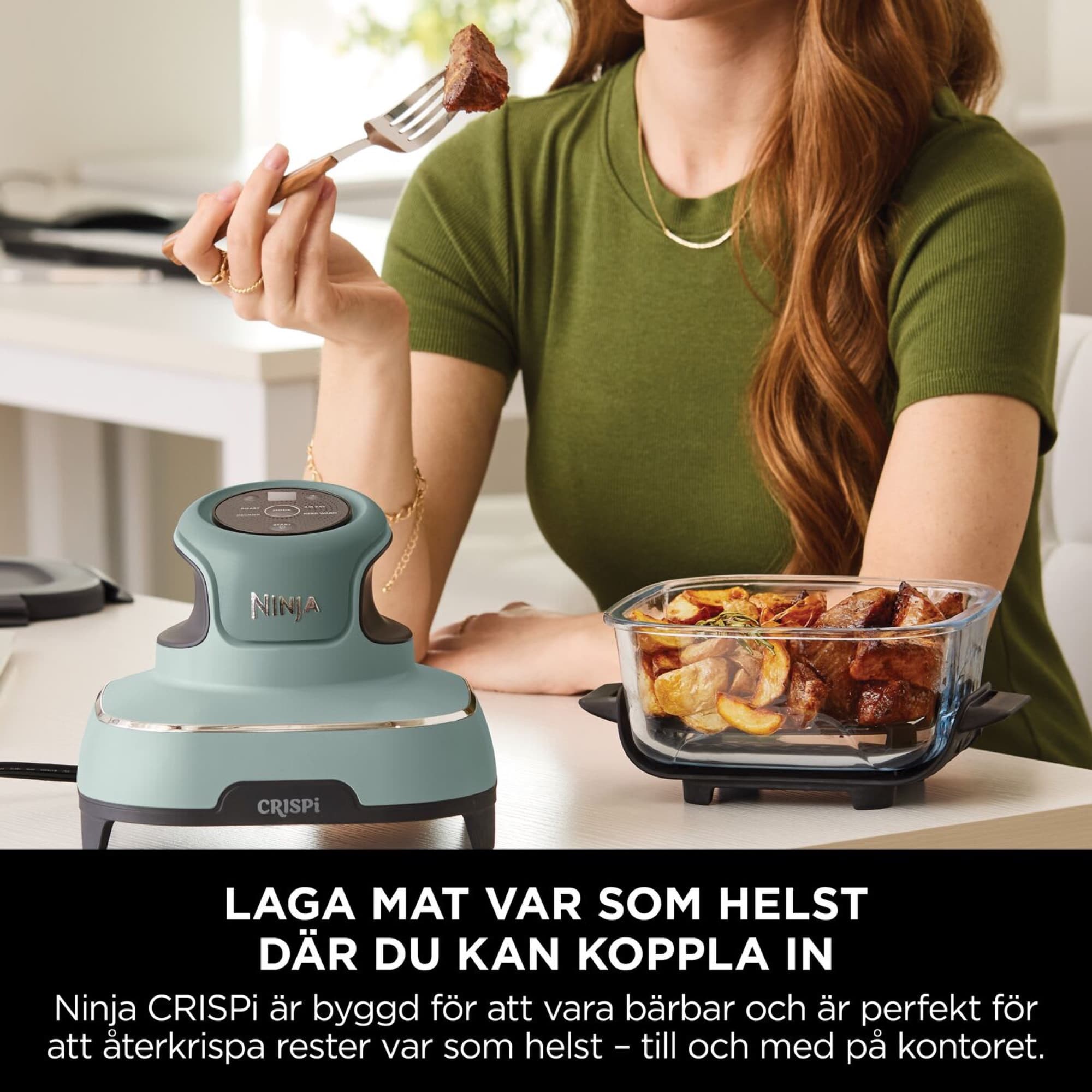 Woman eating lunch straight from the glass dish at her desk