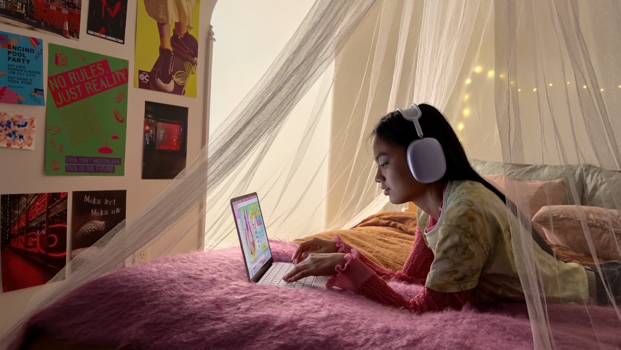MacBook Neo used in a bedroom