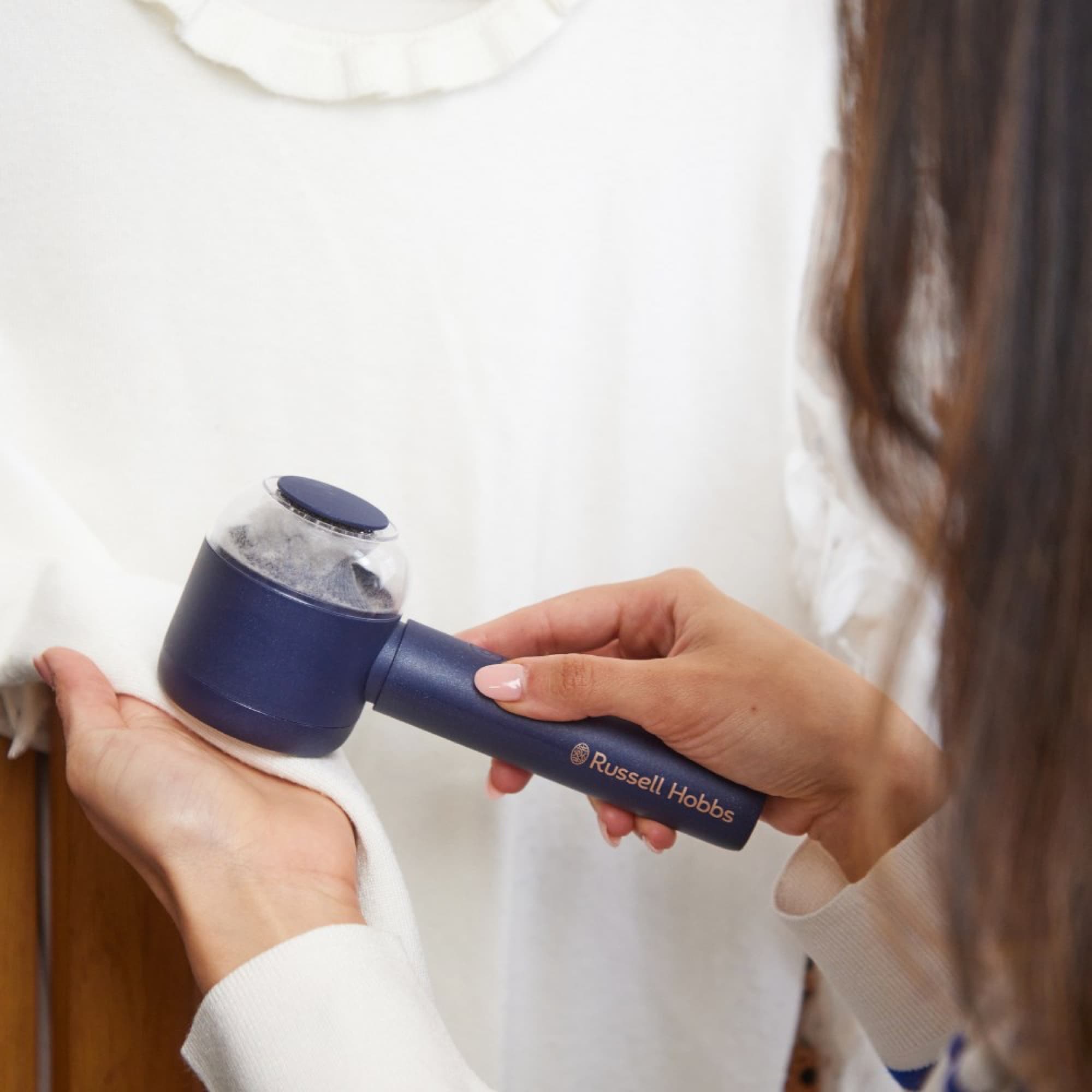 Removing bobbles from a jumper