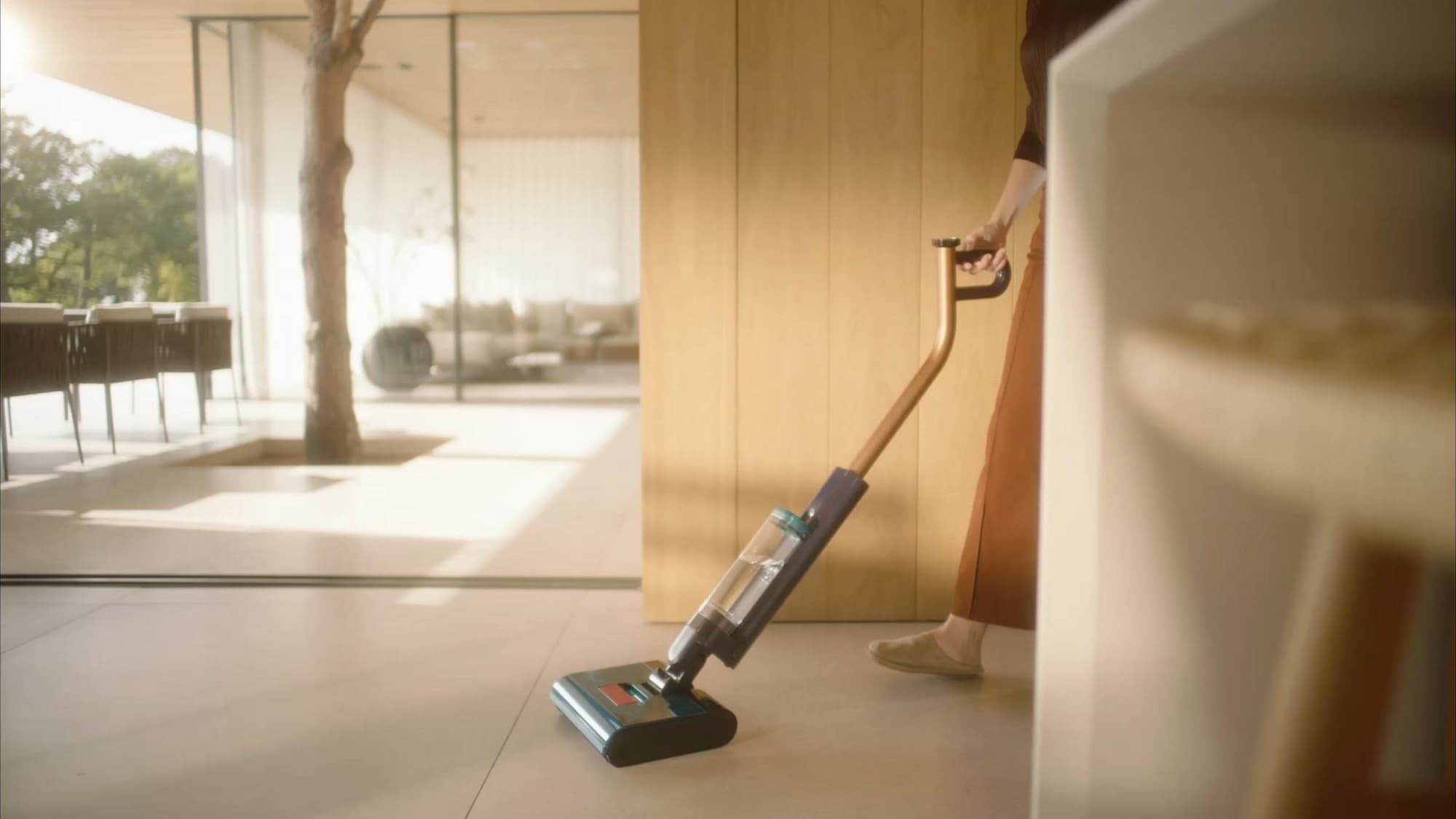 Washing the floor in a bright living room